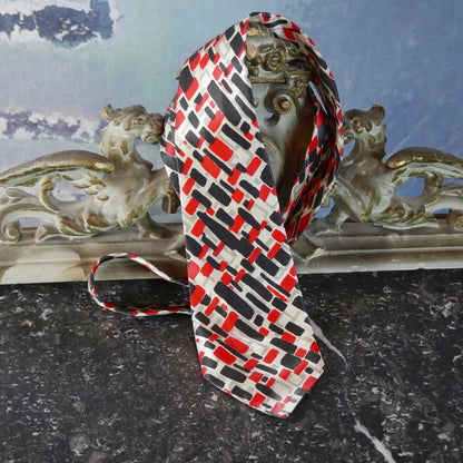 1980s Silk Necktie | European Vintage Abstract Red and Black Geometric Pattern on a Pale Silver Background