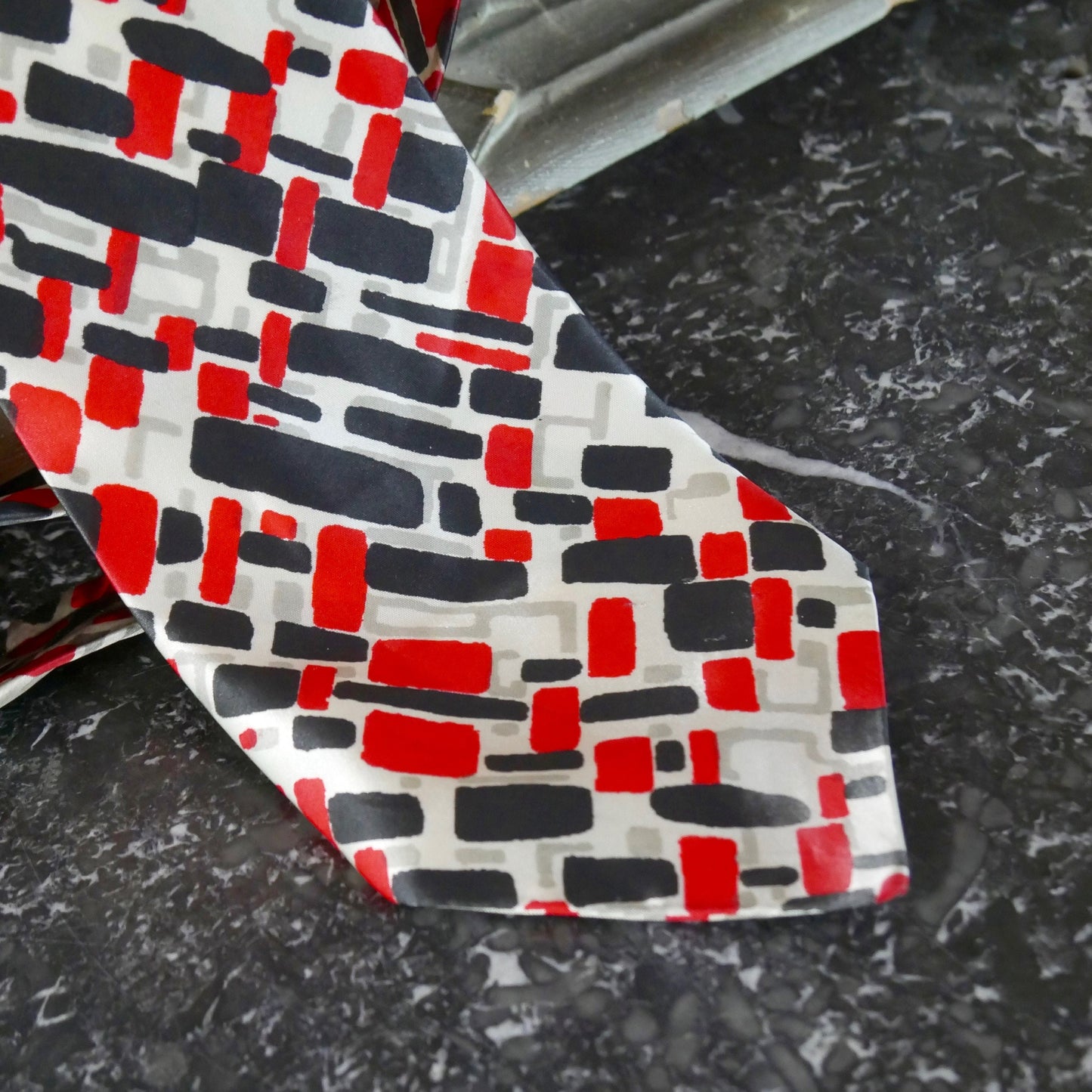 1980s Silk Necktie | European Vintage Abstract Red and Black Geometric Pattern on a Pale Silver Background